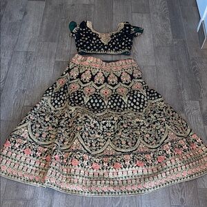 Embroidered deep green and Gold Lehenga Choli